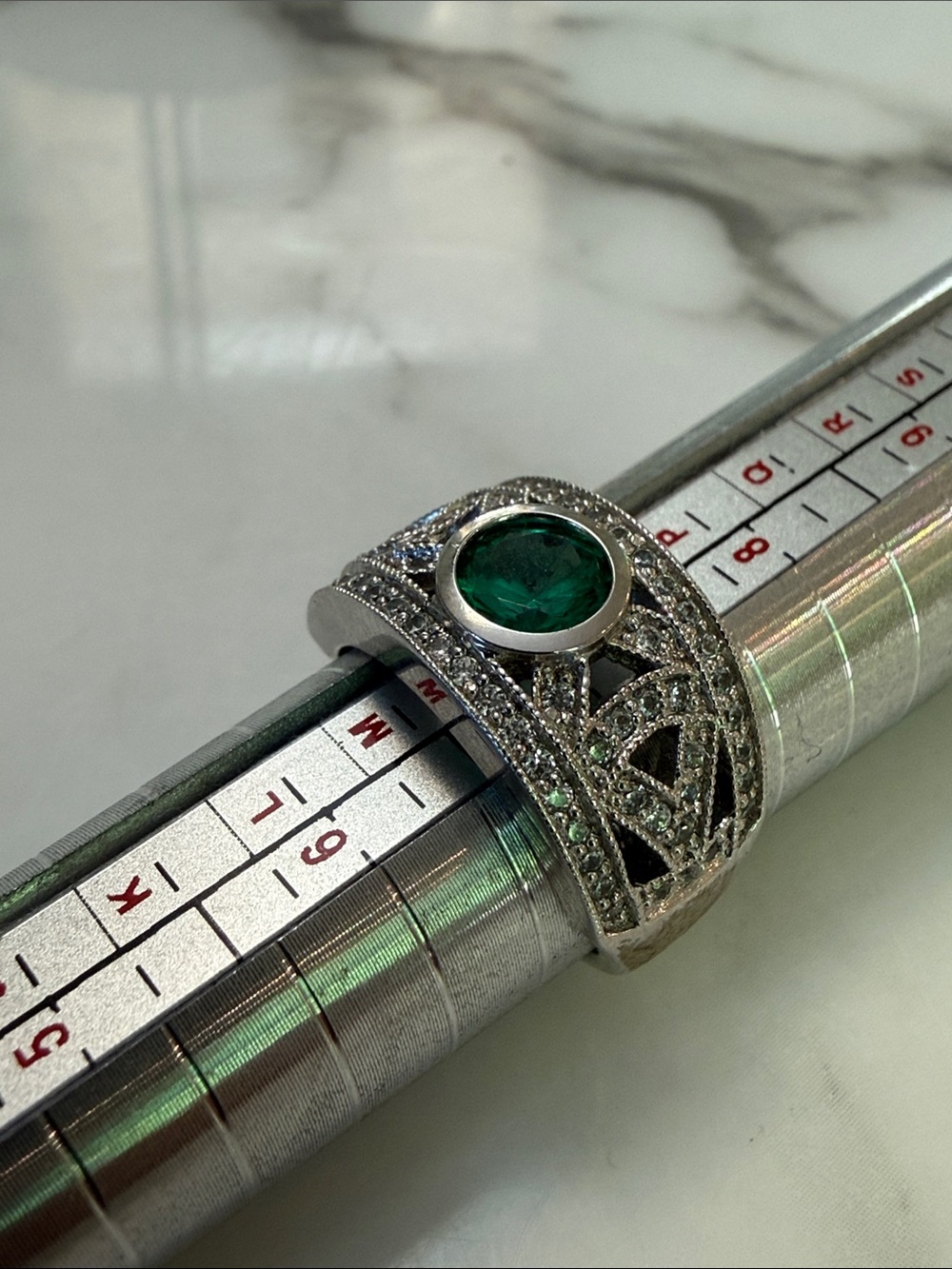Sterling silver ring with simulated emerald, size 7
